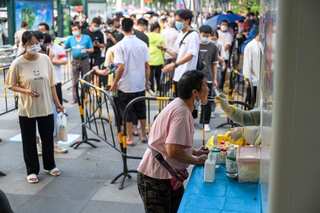China imposes new restrictions in commercial hub Guangzhou amid rising Covid cases