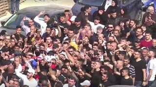 Three alleged Palestinian militants held as thousands gather for the funeral of six killed in Israeli raids