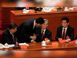 Former Chinese President escorted out of party Congress; Hu Jintao argued about official papers?