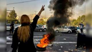 Thousand march towards Mahsa Amini's grave, police fire tear gas and live round to deter protesters
