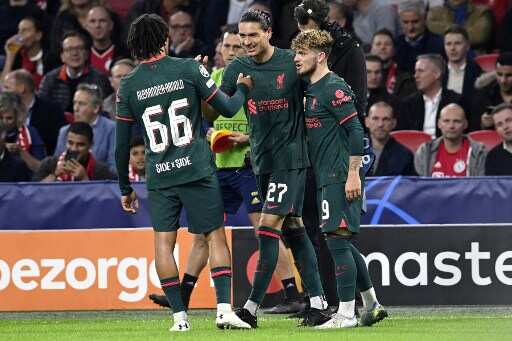 Liverpool steamroller Ajax to cruise into Champions League last 16