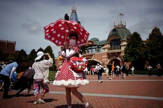 Shanghai's Disneyland reduces operations to curb Covid after China reports over 1,000 cases for the fifth day