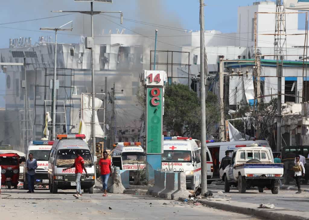 At least 100 killed in Somalia twin car bomb explosions, president blames al-Shabaab