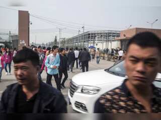 Workers flee manufacturing facility in China to avoid tightening covid-19 curbs