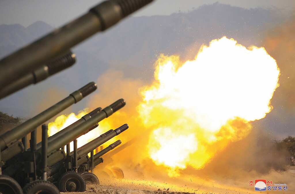 After launching barrage of missiles, North Korea fires over 100 artillery rounds at maritime border