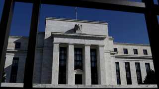 US Fed hits pause on rate hike but warns of another increase later this year