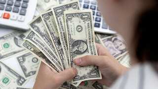 Dollar gains broadly as upbeat US data muddles Fed rate hike views