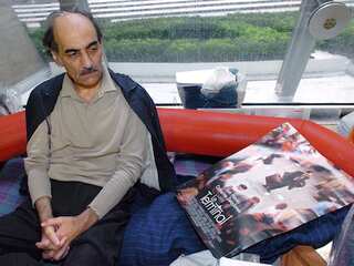 Iranian man who lived in Paris airport dies of natural causes