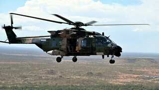 Army pilot says helicopter responsible for 2020 Canberra bushfire landed for toilet break