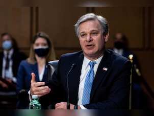 FBI director Christopher Wray deposed under oath in lawsuit over FBI agent's firing