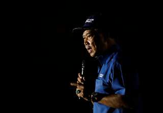 Malaysia's former PM Muhyiddin claims win in hung parliament