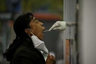 As China battles Covid with lockdowns and curbs, industrial profits drop