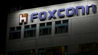 Chaos erupts at Foxconn's iPhone factory in China as workers fight Covid curbs