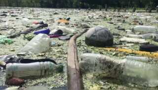 El Salvador's biggest lake, Suchitlan, swamped by trash