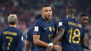Kylian Mbappe double puts holders France into World Cup last 16