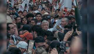 Mexico's President Lopez Obrador leads supporters in march through capital