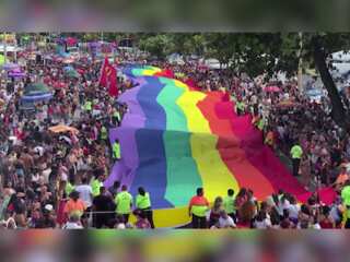 Giant rainbow takes over Rio as a past of Pride Parade