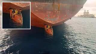 African migrants stowed away on ship's rudder, rescued by Spanish coastguard