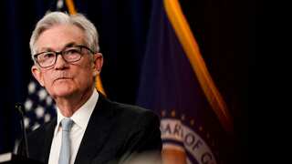 US Fed chief says interest rate hikes could ease 'as soon as December'