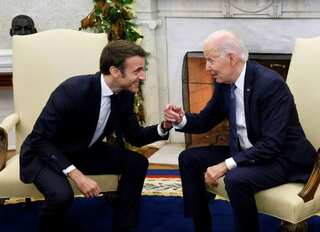 Macron, Biden pledge to hold Russia accountable for committing 'war crimes' in Ukraine