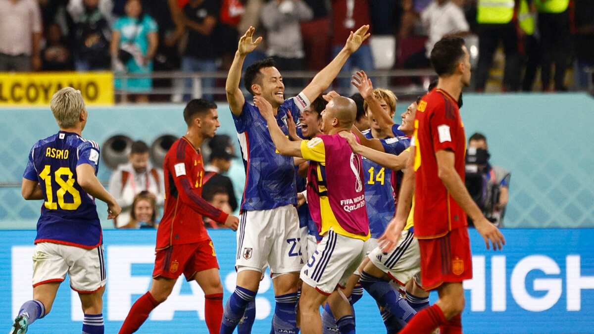 Japan roar back again to beat Spain and advance to last 16 Japan roar back again to beat Spain and advance to last 16