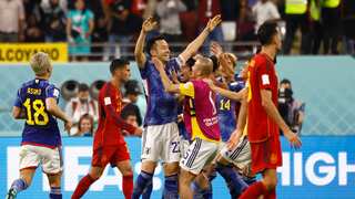 Japan roar back again to beat Spain and advance to last 16