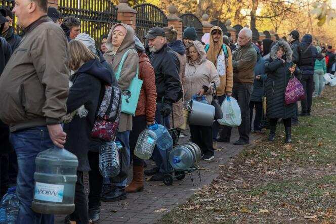 Kyiv residents queue for water amid massive outages due to Russian strikes