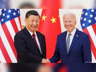 Truth behind US-China handshake
