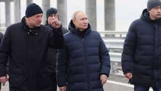 Putin walks along Crimean bridge destroyed as 'birthday gift' in October