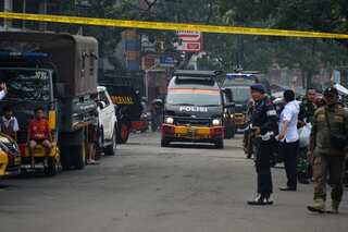 Suicide bombing at Indonesian police station kills two; note condemning new criminal code found