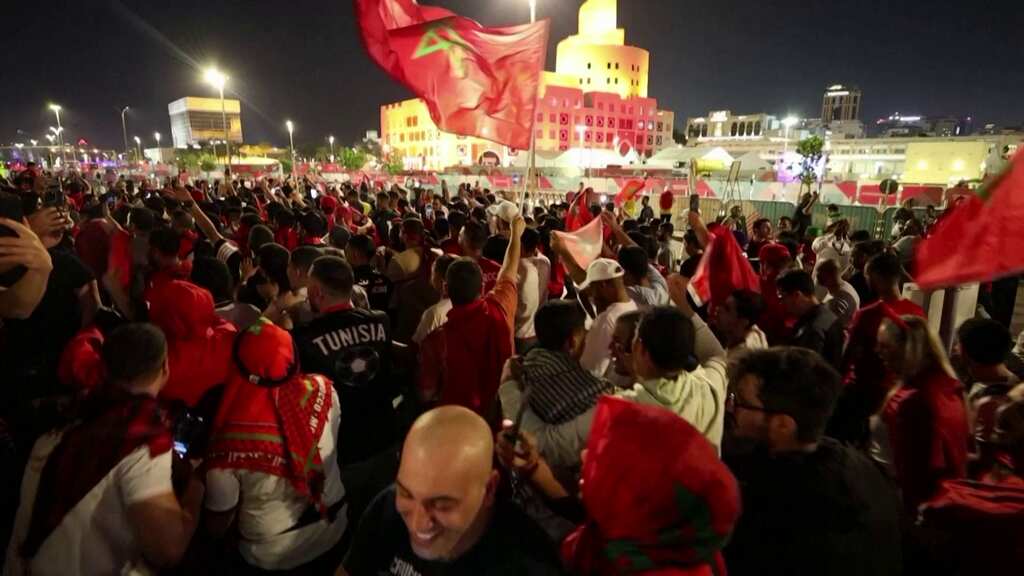Morocco supporters hold parade celebrating Arab victory in Qatar