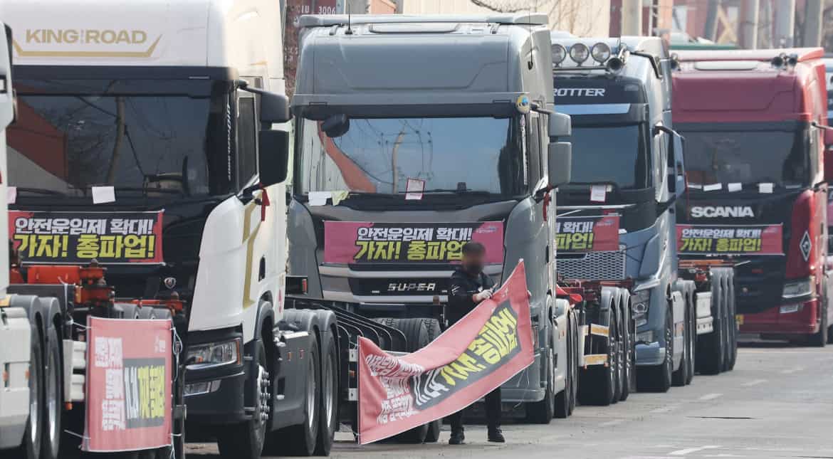 South Korea’s truckers vote to call off strike over minimum wage protection