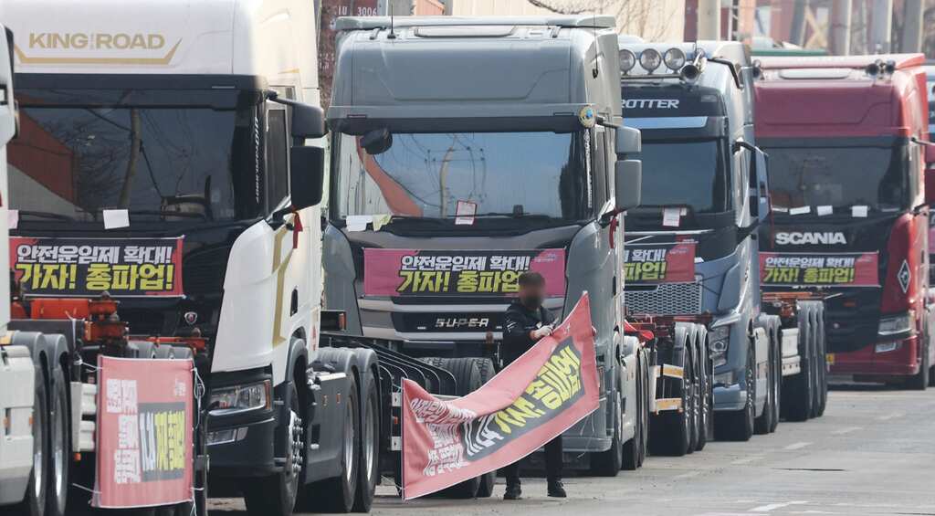 South Korea’s truckers vote to call off strike over minimum wage protection
