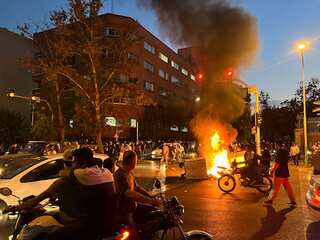 Iran under fire for executing protester: UK, Canada slaps new sanctions on Iran