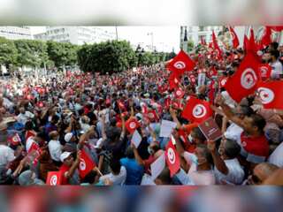 Tunisians protest against President; protesters denounce 'coup'