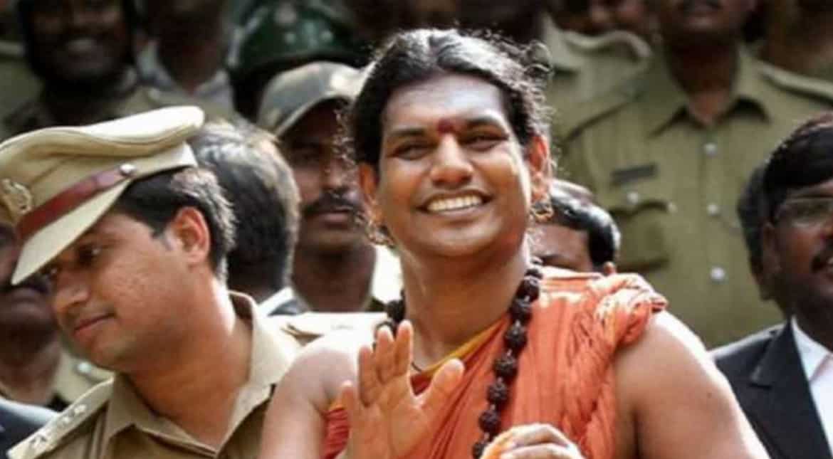 Fugitive Hindu guru's UK representative attended Tories' party at House of Lords Fugitive Hindu guru's UK representative attended Tories' party at House of Lords