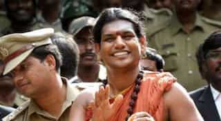 Fugitive Hindu guru's UK representative attended Tories' party at House of Lords