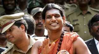 Fugitive Hindu guru's UK representative attended Tories' party at House of Lords