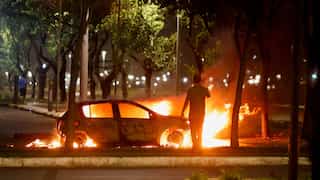 Bolsonaro supporters try to invade police HQ on day Lula is certified as president