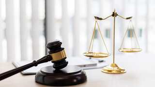 New Zealand 'suitcase murders': 42-year-old mother charged with killing two children pleads not guilty