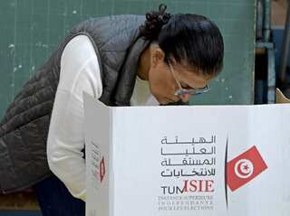 Tunisia holds polls, opposition terms the exercise farce, calls for its boycott over economic crisis