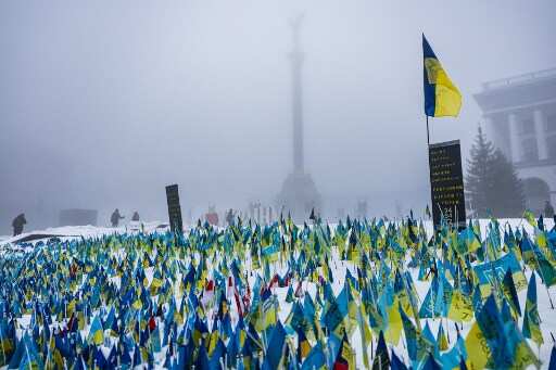 Ukraine works to restore power as Vladimir Putin meets Russian military officials