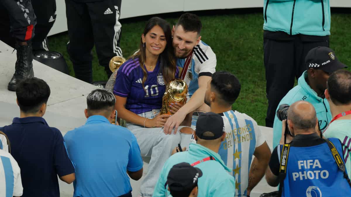 The one with the woman behind the G.O.A.T