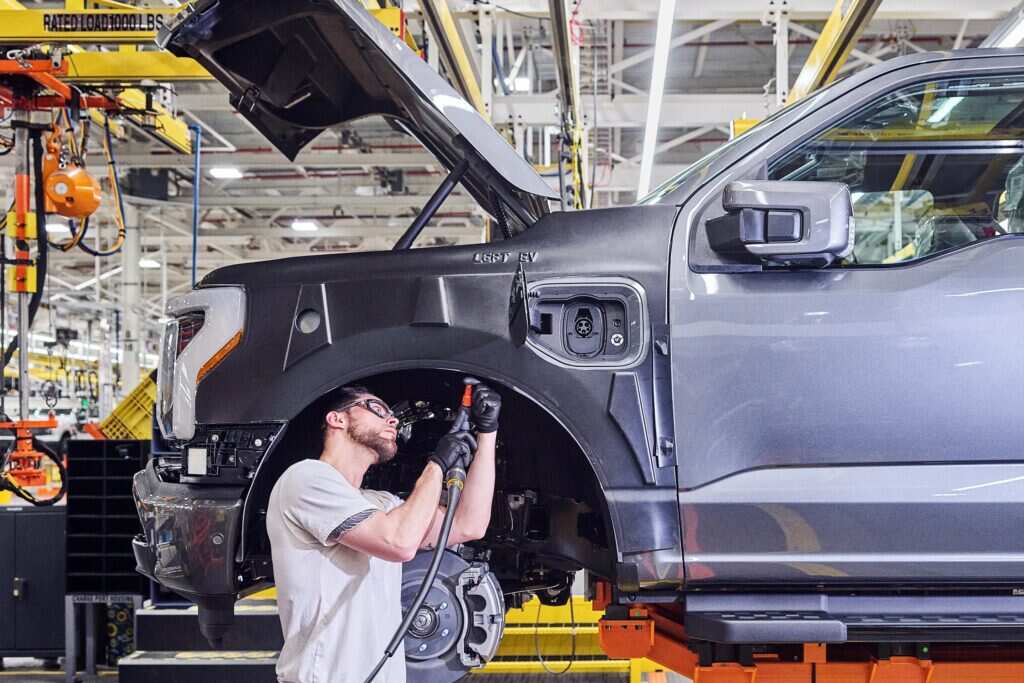 Mechanics learn skills and risks associated with servicing EVs