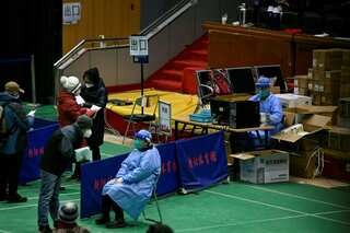 China reports first Covid-related deaths in weeks as questions remain on official count