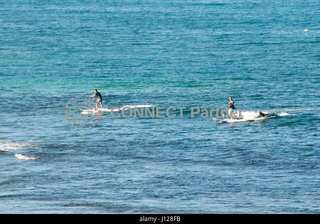 Teenagers found alive on island after drifting away overnight on Australian waters