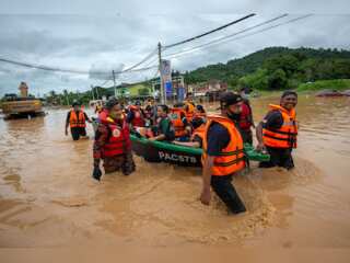 Flooding in Malaysia disrupted life; displacing over 66,000 people in relief shelters