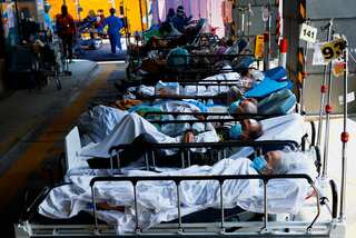 WATCH: Exhausted doctor collapses while attending patients amid China's Covid surge