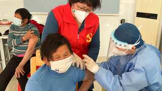 China accepts Germany's mRNA COVID vaccines as cases spike, distributes free fever, cold medicines