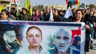 Kurdish people protest in Syria against Paris gun attack that killed three from community
